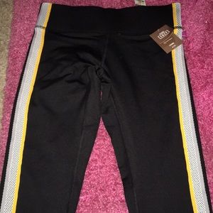 ack and yellow VS Pink leggings